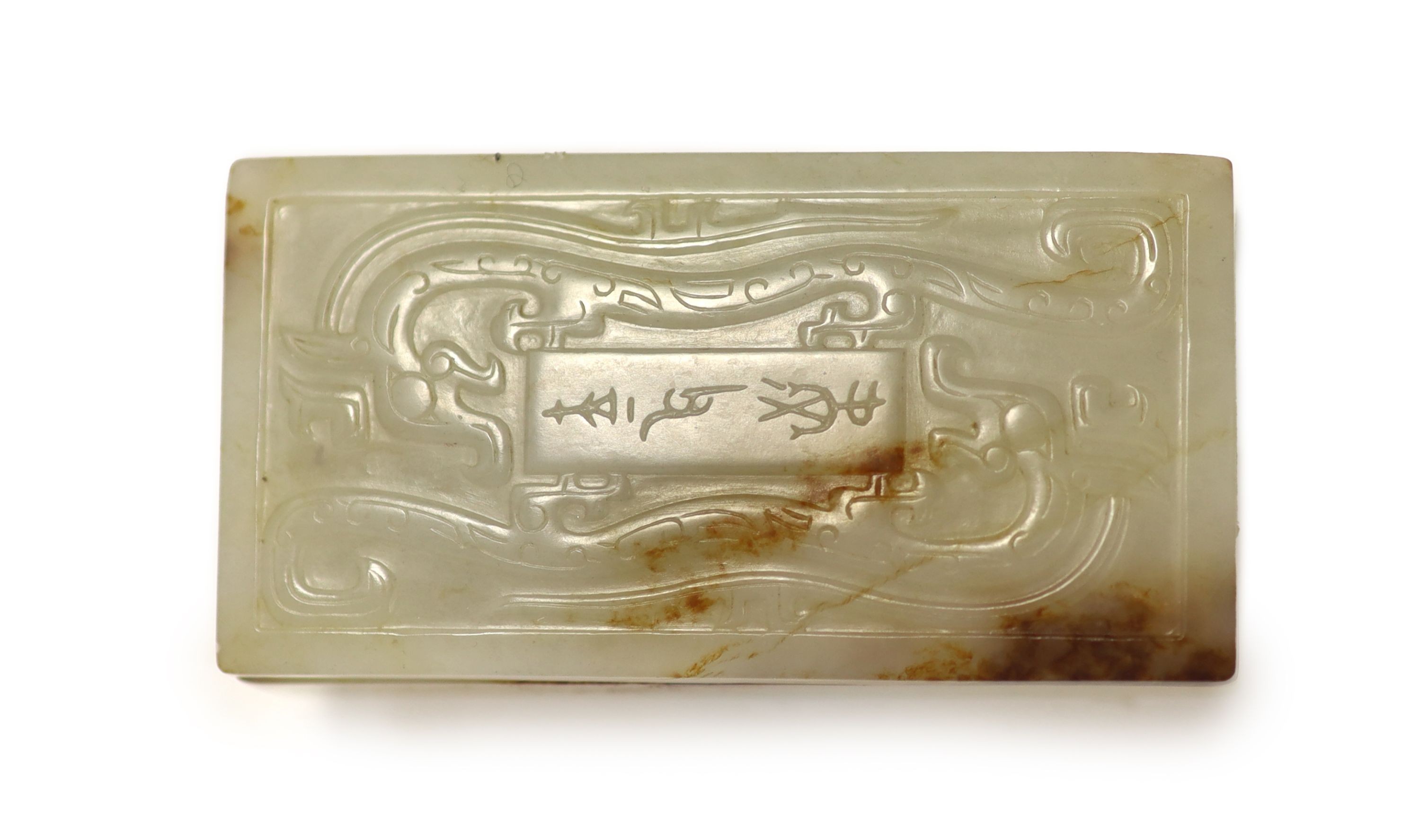 A Chinese archaistic white and brown jade box and cover, 8.3 x 4.3 cm